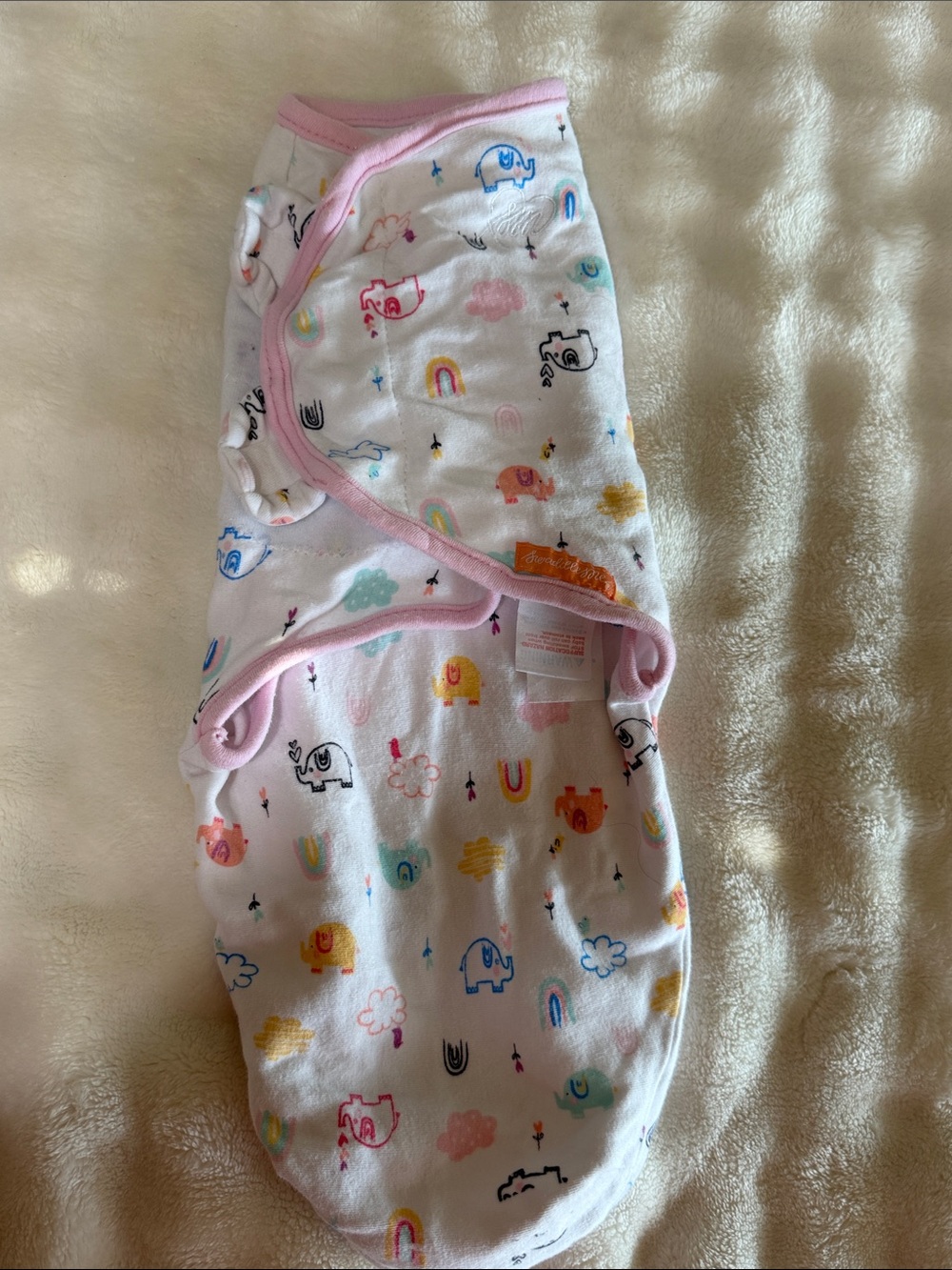 SwaddleMe White Baby Swaddle with Pink Trim and Multicolor Elephant Print
